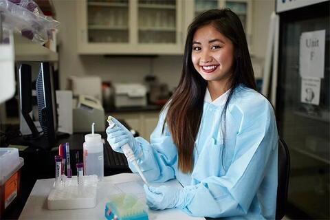 A student smiling